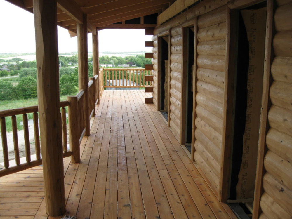 denmark-half-log-siding-cedar-porch-and-cedar-deck-railing